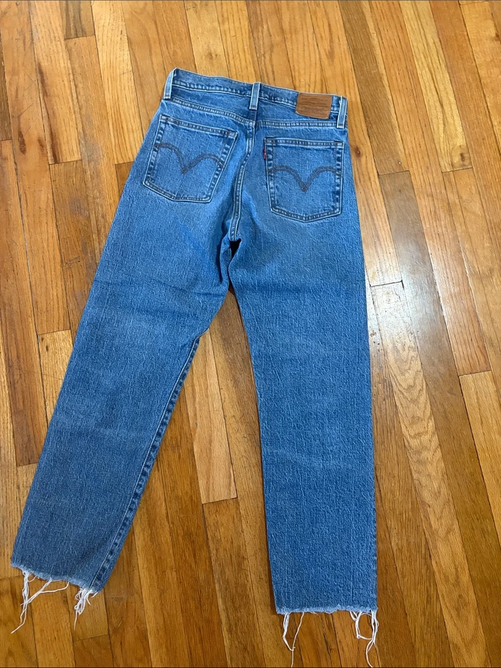 Levi 25 High-Rise Straight Leg Women’s Jeans in Medium Blue